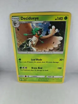 DECIDUEYE SM55 SUN & MOON PROMO POKEMON (COSMO HOLO RARE, LP) - Image 1