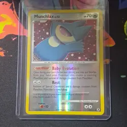 Pokemon Munchlax 69/111 Rising Rivals Reverse Holo TCG Card English - Image 1