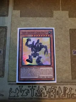 YUGIOH TCG TOON ANCIENT GEAR GOLEM DRL2-EN022 SUPER 1ST EDITION NM - Image 1