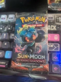 Pokemon TCG: Sun & Moon-Burning Shadows Booster Pack (10 Cards) 820650802300 - Image 1