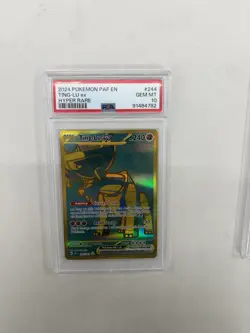 Ting-Lu ex 244/091 SV: Paldean Fates Holo PSA 10 Pokemon Cards - Image 1