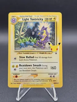 Light Toxtricity SWSH137 Celebrations Promo Card Holo NM - Image 1