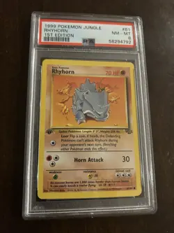 1999 Pokemon 1st Edition #61 - Rhyhorn PSA 8 - Image 1