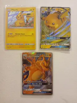 Sm Black Star Promo X3 Pokemon Card Bundle Holo Pikachu Raichu Gx Charizard Gx - Image 1