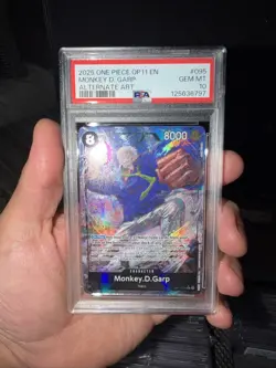 2025 ONE PIECE OP11-A FIST OF DIVINE SPEED 095 MONKEY D. GARP ALTERNATE ART - Image 1