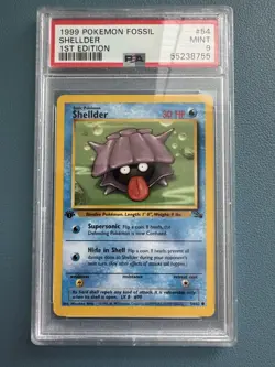 1999 POKEMON FOSSIL 1ST EDITION #54 SHELLDER PSA 9 - Image 1
