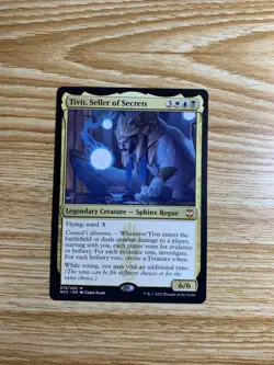 Tivit, Seller of Secrets Commander: Streets of New Capenna Regular - Image 1