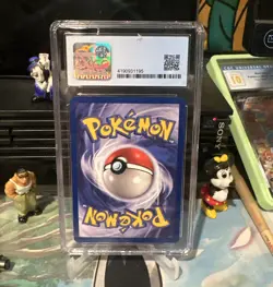 CGC 9 MINT Poke Ball 1st Edition Jungle 64/64 Pokemon 1999 Trainer - Image 2