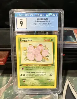 CGC 9 MINT Exeggcute 1st Edition Jungle 52/64 Pokemon 1999 Non-Holo - Image 1