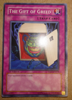 The Gift of Greed - TAEV-EN079 - 1st Edition - YuGiOh! - Image 1