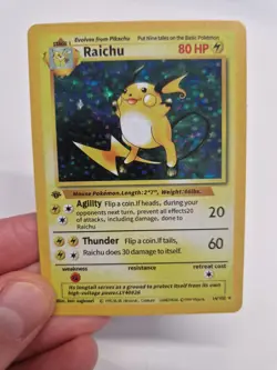 1st Edition Raichu 14/102 Base Set Holo Pokemon (PRXY Fan Display) - Image 1