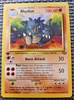 1999 Pokemon Jungle 1st Edition #45 Rhydon NM Ink Mark - Image 1