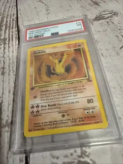 1999 POKEMON FOSSIL 1ST EDITION #12 MOLTRES - HOLO PSA 7 - Image 4