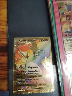 2017 Pokemon Charizard GX Rainbow Gold Foil Collector Card - Image 1