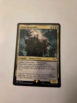 1x Sister Hospitaller NM-Mint, English Commander: Universes Beyond: Warhammer 40 - Image 1