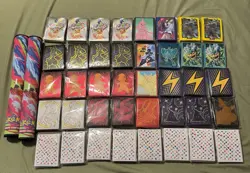40 New Pokemon Card Sleeves And 2 Play Mates - Image 1