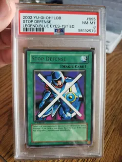 2002 Yu-Gi-Oh LOB-095 Stop Defense Legend of Blue Eyes 1st Edition PSA 8 NM-MT - Image 1
