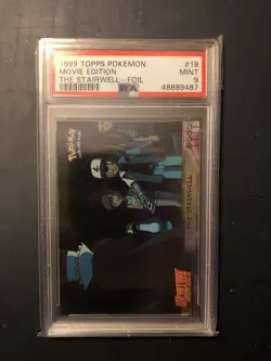 The Stairwell #19 1999 Topps Pokemon First Movie Edition Foil Black Logo PSA 9 - Image 1