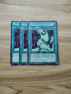 Yu-Gi-Oh! - Malevolent Nuzzler 3X - Full Playset - Image 1