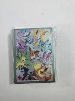 Sealed Eevee Card Sleeves 65ct From Pokemon Prismatic Evolutions plus free card - Image 1
