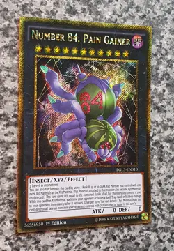 Yugioh Number 84: Pain Gainer PGL3-EN010 Gold Secret Rare 1st Edition NM 2016 - Image 2