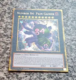 Yugioh Number 84: Pain Gainer PGL3-EN010 Gold Secret Rare 1st Edition NM 2016 - Image 4