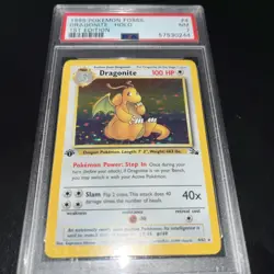 1999 Pokemon Fossil 1st Edition Dragonite Holo Card #4/62 PSA 7 - Image 1