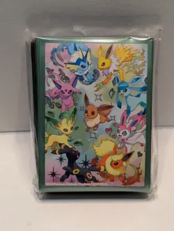 Sealed Eevee Card Sleeves 65ct From Pokemon Prismatic Evolutions plus free card - Image 1
