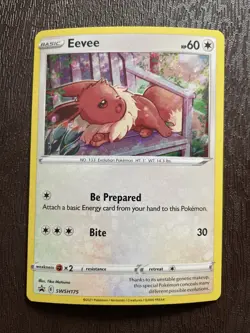 Eevee SWSH175 Black Star Promo Fusion Strike NM Pokemon Card with swirl - Image 1