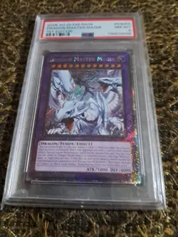 YUGIOH EN055 RA04 DRAGON MASTER MAGIA 1ST EDITION PLATINUM SECRET RARE PSA 8 - Image 1