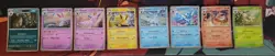 Prismatic Evolutions Costco 8 Mini Tin Cosmos Promo Cards SET - Image 1