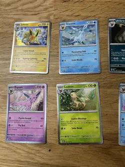Pokemon TCG Prismatic Evolutions Costco Mini Tin Cosmos Promo Cards Set Of 8 - Image 3