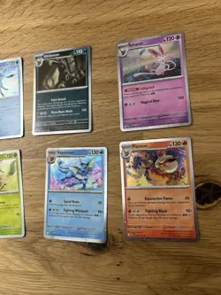 Pokemon TCG Prismatic Evolutions Costco Mini Tin Cosmos Promo Cards Set Of 8 - Image 4