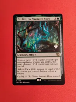 Ozolith, the Shattered Spire Promo - March of the Machine - Near Mint - Image 1