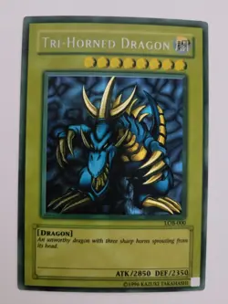 Yu-Gi-Oh! TCG Tri-Horned Dragon LOB-000 Secret Rare Unlimited - Image 1