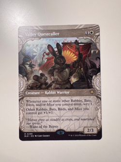Magic MTG • Valley Questcaller (Showcase) • Bloomburrow 299 • R • ENG • MINT - Image 1