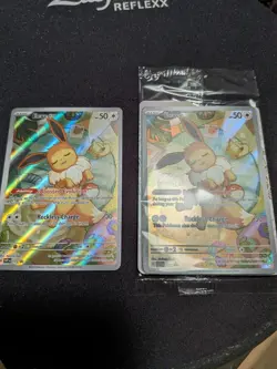Eevee Promo SVP-173 Prismatic Evolutions ETB - Sealed + Raw - 2 Cards! - Image 1