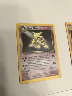 POKEMON CARD LOT: BASE SET ALAKAZAM, TEAM ROCKET, RAYQUAZA COLLECTION, AND MORE - Image 4