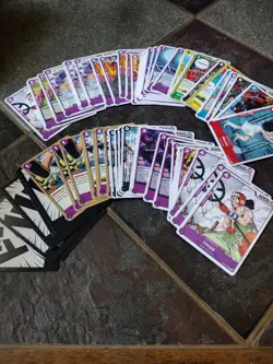 Assorted One Piece Holo Trading Cards And Partial Basic Non Holo Starter Set - Image 2