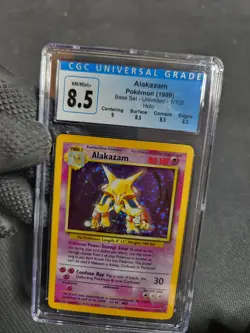 1999 Pokemon Base Set Unlimited Alakazam Holo Rare Graded Card CGC 8.5 like PSA - Image 1