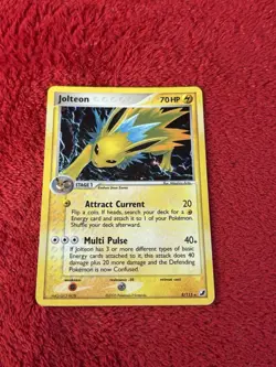 Jolteon 8/115 Unseen Forces Holo Pokemon Card Played - Image 1