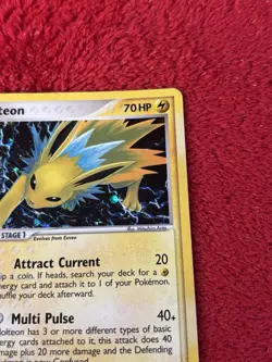 Jolteon 8/115 Unseen Forces Holo Pokemon Card Played - Image 3
