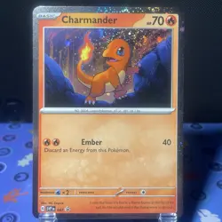 Pokemon Charmander SVP 047 Black Star Promo Cosmos With SWIRL Above Rocks - Image 1
