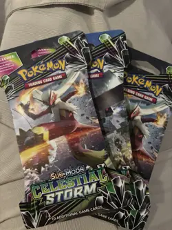 POKEMON TCG SUN & MOON CELESTIAL STORM SEALED BOOSTER Sleeved 3 PACKS - Image 1