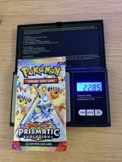Pokemon TCG Prismatic Evolutions Heavy Booster Pack 22.85g Brand new sealed - Image 1