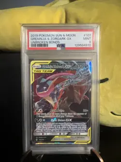 2019 Pokemon Sun & Moon Greninja & Zoroark GX 107 Unbroken Bonds Tag Team PSA 9 - Image 1