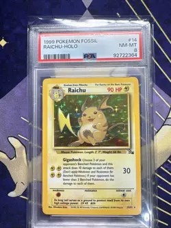 PSA 8 - 1999 Pokemon Fossil RAICHU HOLO #14 (6753) - Image 1