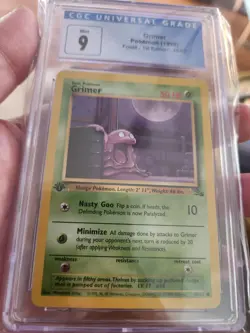 Grimer 48/62 CGC 9 Fossil 1st Edition GEM Mint Pokemon WOTC 1999 PSA - Image 1