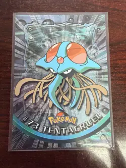 1999 (FOIL) Pokemon Card #73 Tentacruel Series 1 TV Animation Black Label/Logo - Image 1