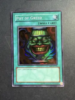 Yugioh Pot Of Greed Super Rare DB1-EN134 Lightly Played - Image 1